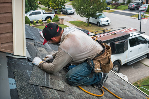 Professional Roofing technician working in Milmay, NJ